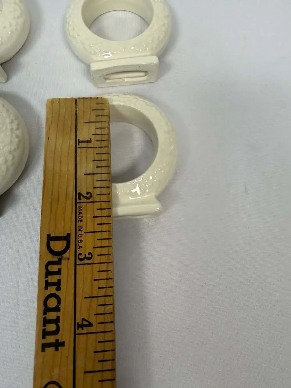 Set of 4 Vintage White Ceramic Floral Embossed Standing Napkin Rings